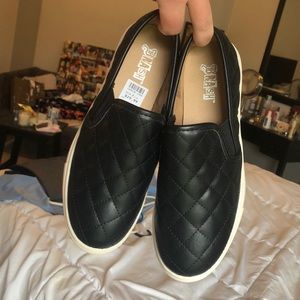 black criss cross design shoes